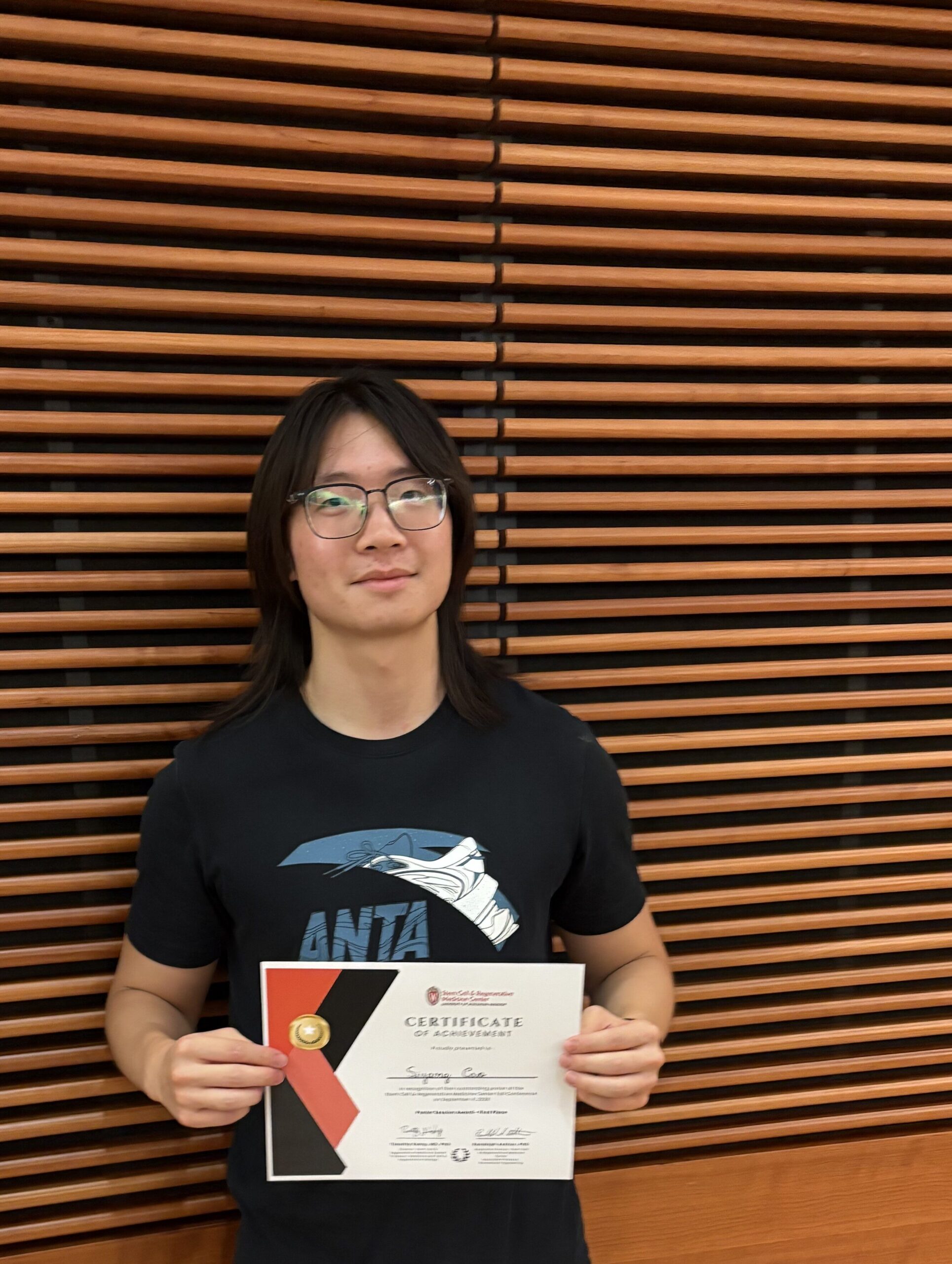 headshot with certificate