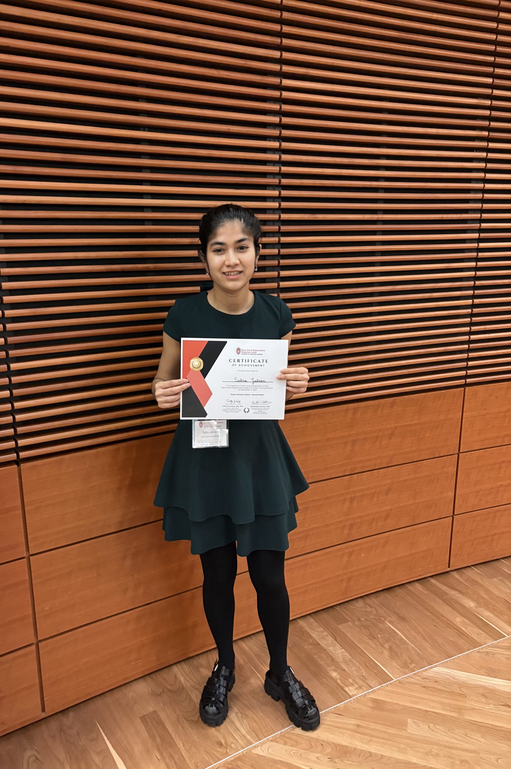 Headshot with certificate